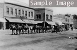 8" X 10" Photo 1870 Wagon Train Main Street, Front Of Hotel Western, Fallo. Fixed Price $25.99.