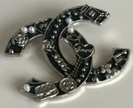 Authentic Chanel 21K Pearl Turn-lock Brooch Fall/winter 2021. Fixed Price $600.00.